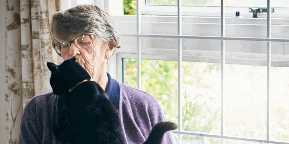 Photo of woman and cat